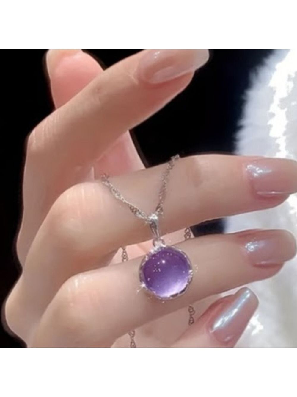 Silver plated necklace with amethyst pendant, about 17.5 inches long.